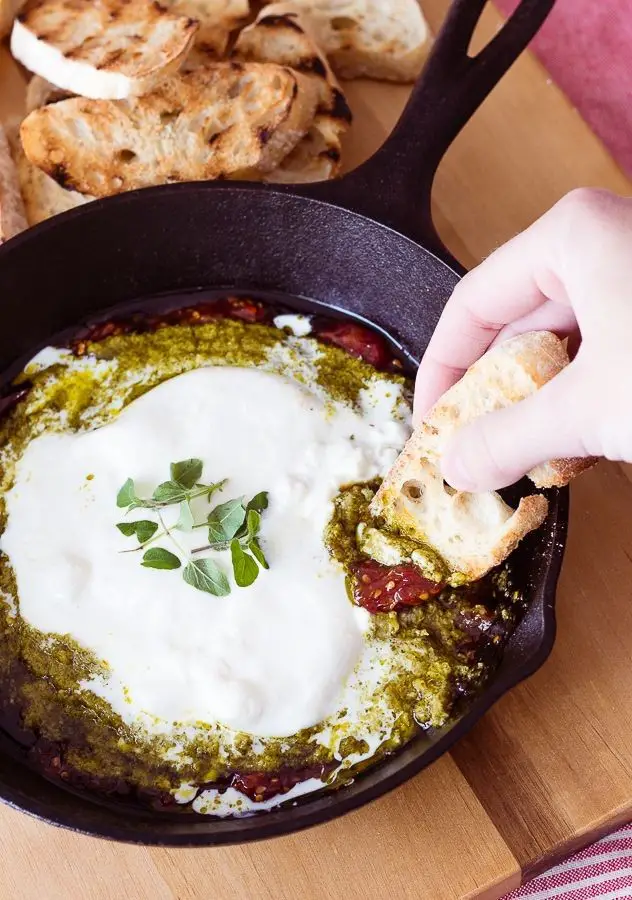 Burrata Crostini With Tomato Jam & Pesto