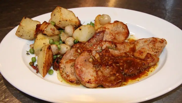 Balsamic Pork Chops With Roasted Potatoes And Peas